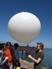 Mark holds the inflated balloon, ready to go!