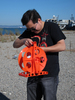 Andrew preparing the cord reel, this time loaded with 2,000 feet of kite line.