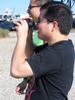 The Ho Brothers survey the area. The deck of the ex-USS Tripoli is visible in the background.