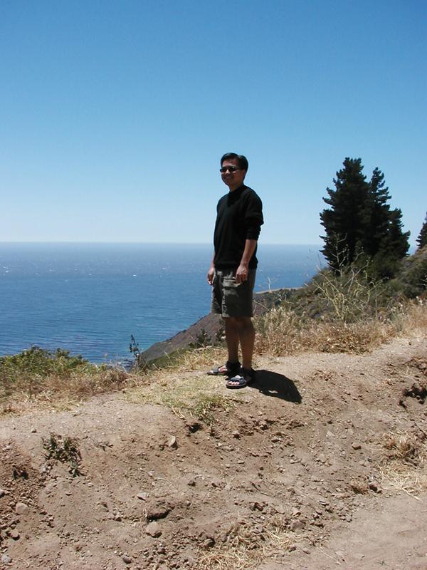 Andrew in front of the ocean to the southwest