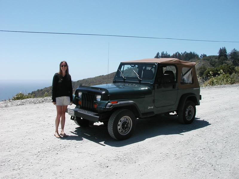 Holly with the Jeep at a beautiful vista point on Highway 1 south of Big Sur