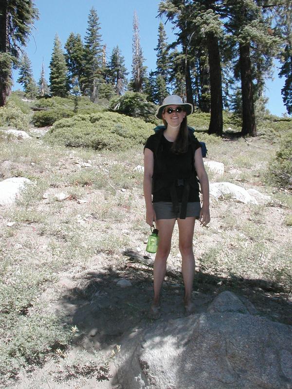 Holly standing on the trail a few hundred yards up the trailhead