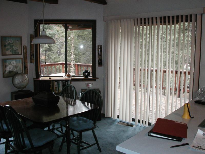 The dining room, which faces the rear deck