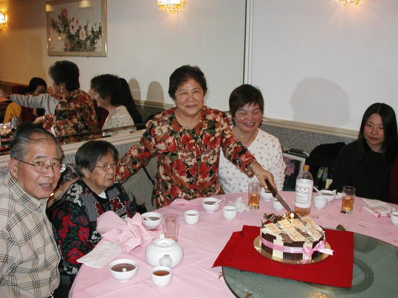 More people around the birthday cake