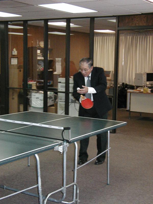 My dad delivering a backhand spin serve with his HURRICANE-2 ping-pong paddle