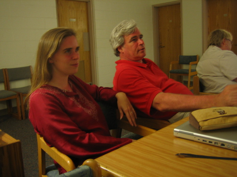 Holly and her father chatting with Ann