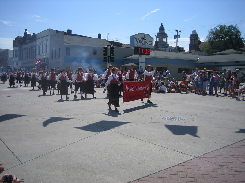 An army of Nordic dancers parades down the street